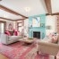 Colorful, family-focused living room in Minneapolis designed by LiLu Interiors